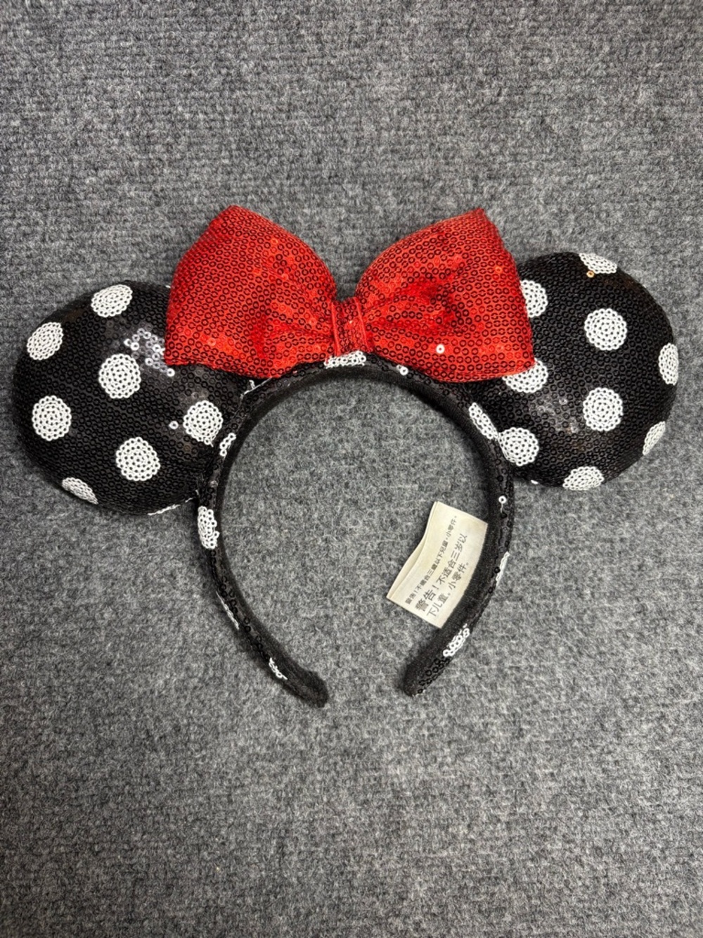 Minnie Mouse Disney Parks headband black and white polka dot sequins red bow